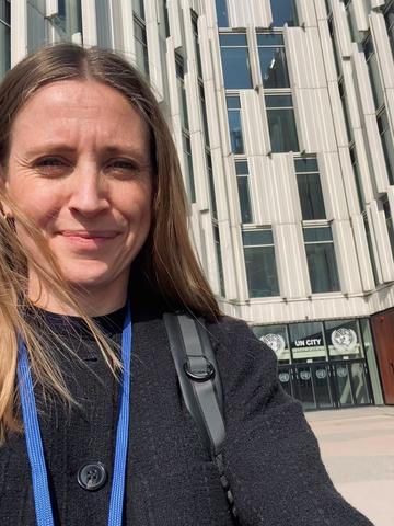 Selfie of Martha Nicholson (the author) in front of the 'UN City Copenhagen'