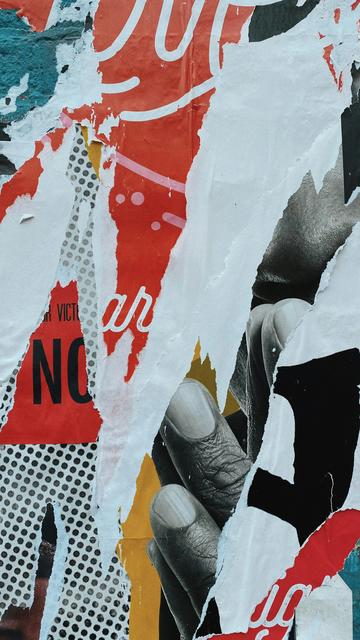 Abstract collage. The author describes it as 'person in black pants and black shoes, standing on snow covered ground'