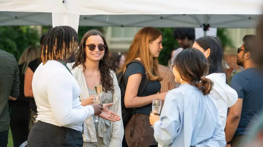 GUDTP Students chatting and drinking