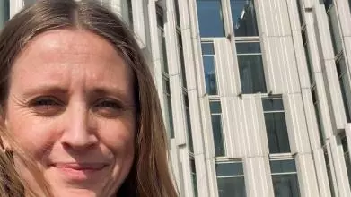 Selfie of Martha Nicholson (the author) in front of the 'UN City Copenhagen'