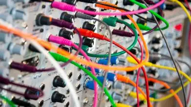 An electric board with connected cables of different colours