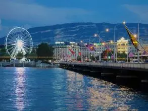 Evening time photo of the Pont du Mont-Blanc, Geneva, Switzerland.