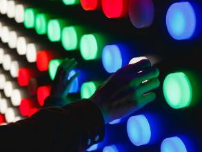 People holding assorted colour led lights