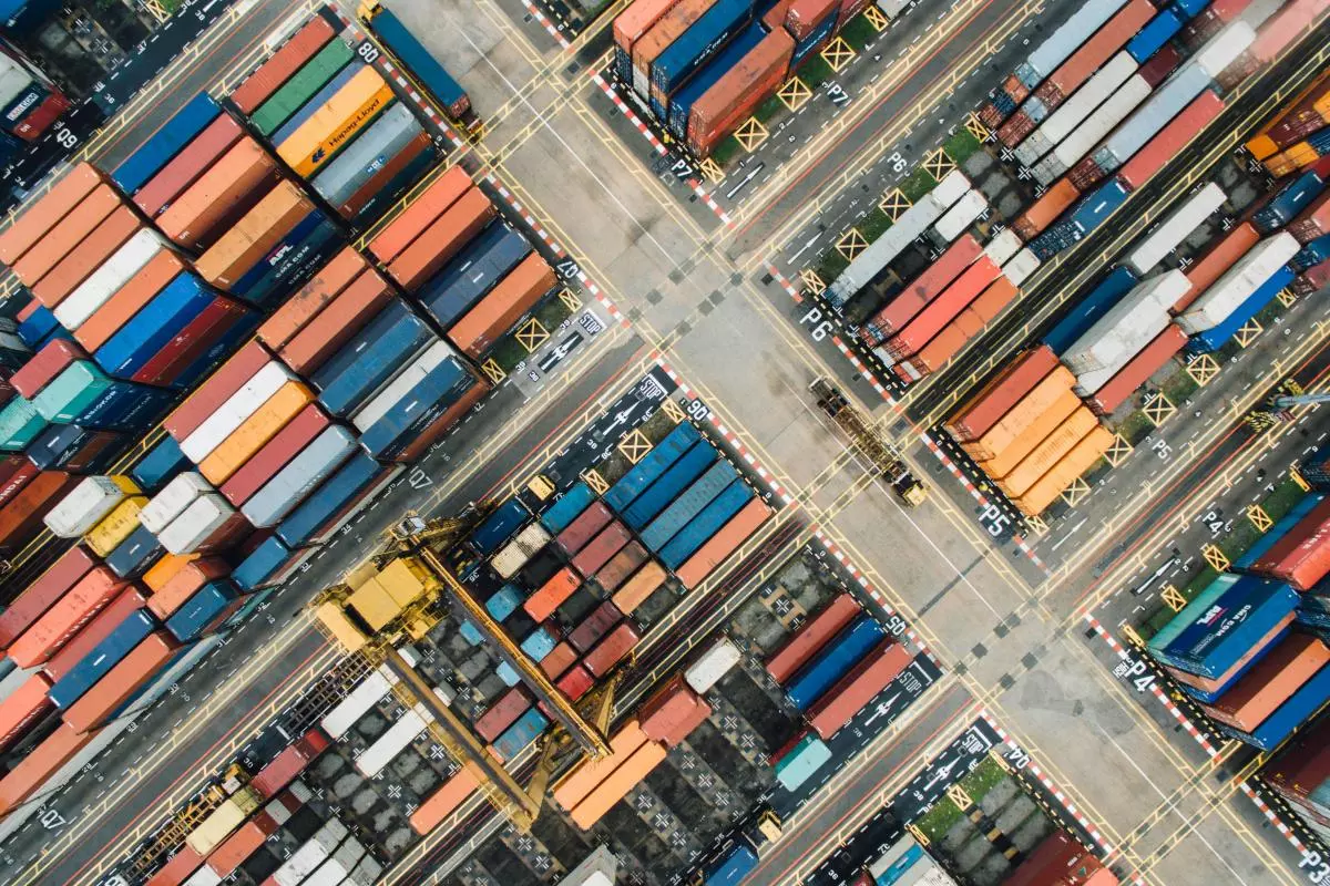 Aerial view of stacked containers of different colours